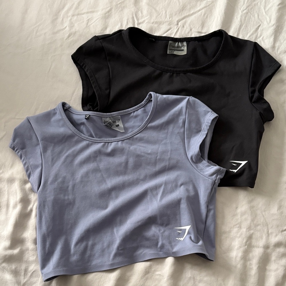 2 Gymshark Short Sleeve crop workout tees in black and periwinkle